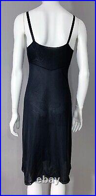 1970s Women's Sears. The Doesn't Slip Black Minimal Slip Dress