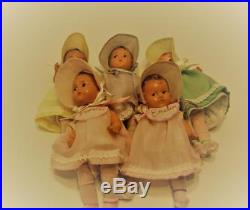 Vintage 1935 7.5 Dionne Quintuplets in new Dresses, slips, hats, bibs and diaper